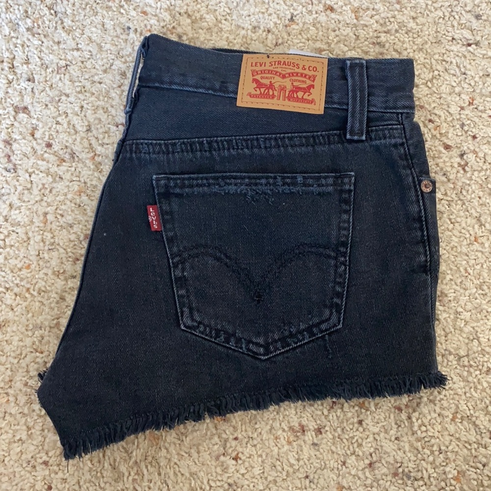 Levi’s Low Rise Distressed Denim Shorts